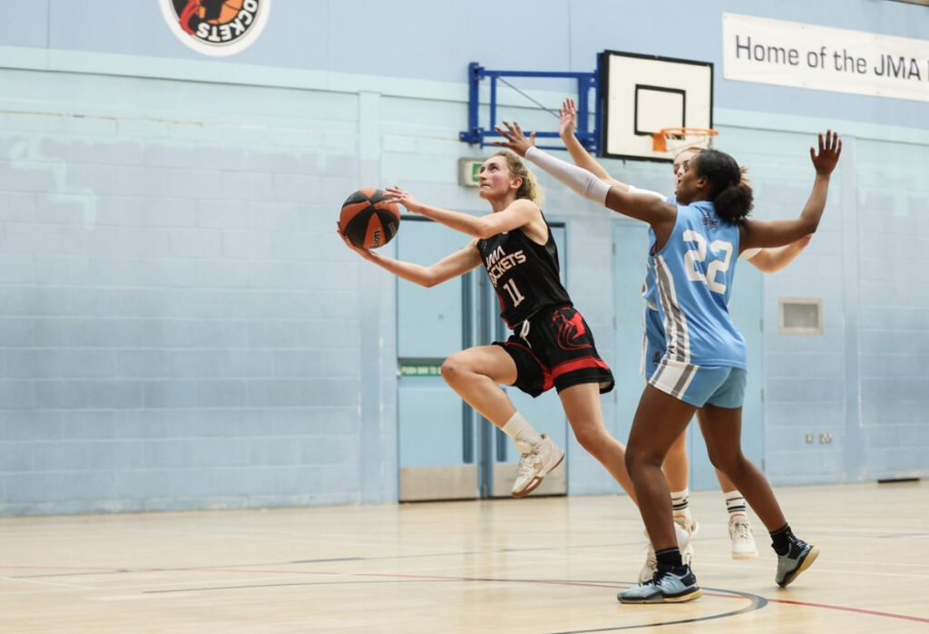 amba thompson going for a lay-up