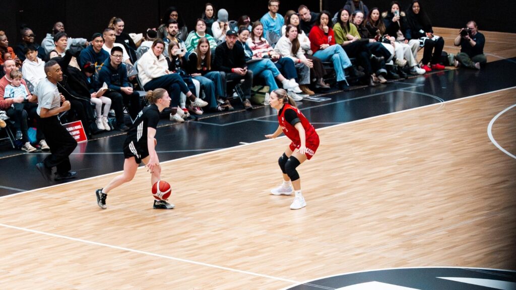 Olivia Forster defending