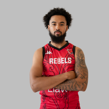 MENS BASKETBALL PLAYER WITH CROSSED ARMS