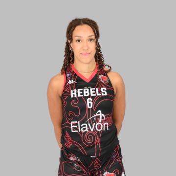 FEMALE BASKEBALL PLAYER SMILING