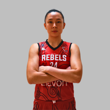 female basketball player with crossed arms