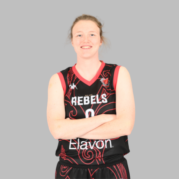 female basketball player crossing her arms and smiling