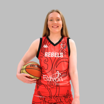 FEMALE BASKETBALL PLAYER HOLDING A BASKETBALL