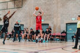 male basketball player shooting