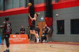 men's volleyball player spiking