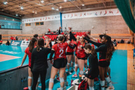 essex rebels volleyball group huddle