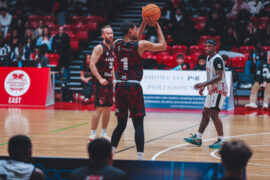 MICHAEL AMAKO TAKING A THREE POINT SHOOT