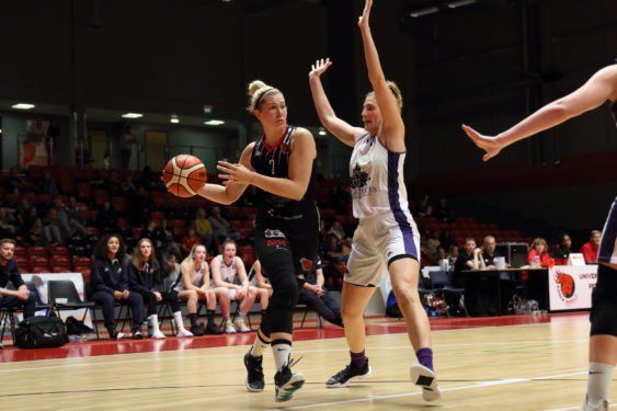 Essex Rebels Womens basketball team passing the ball