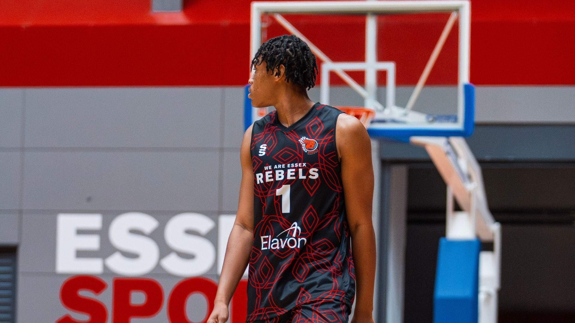 Michael Amako walking and looking to the side