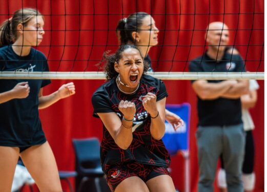 Women's Volleyball Player celebrating score