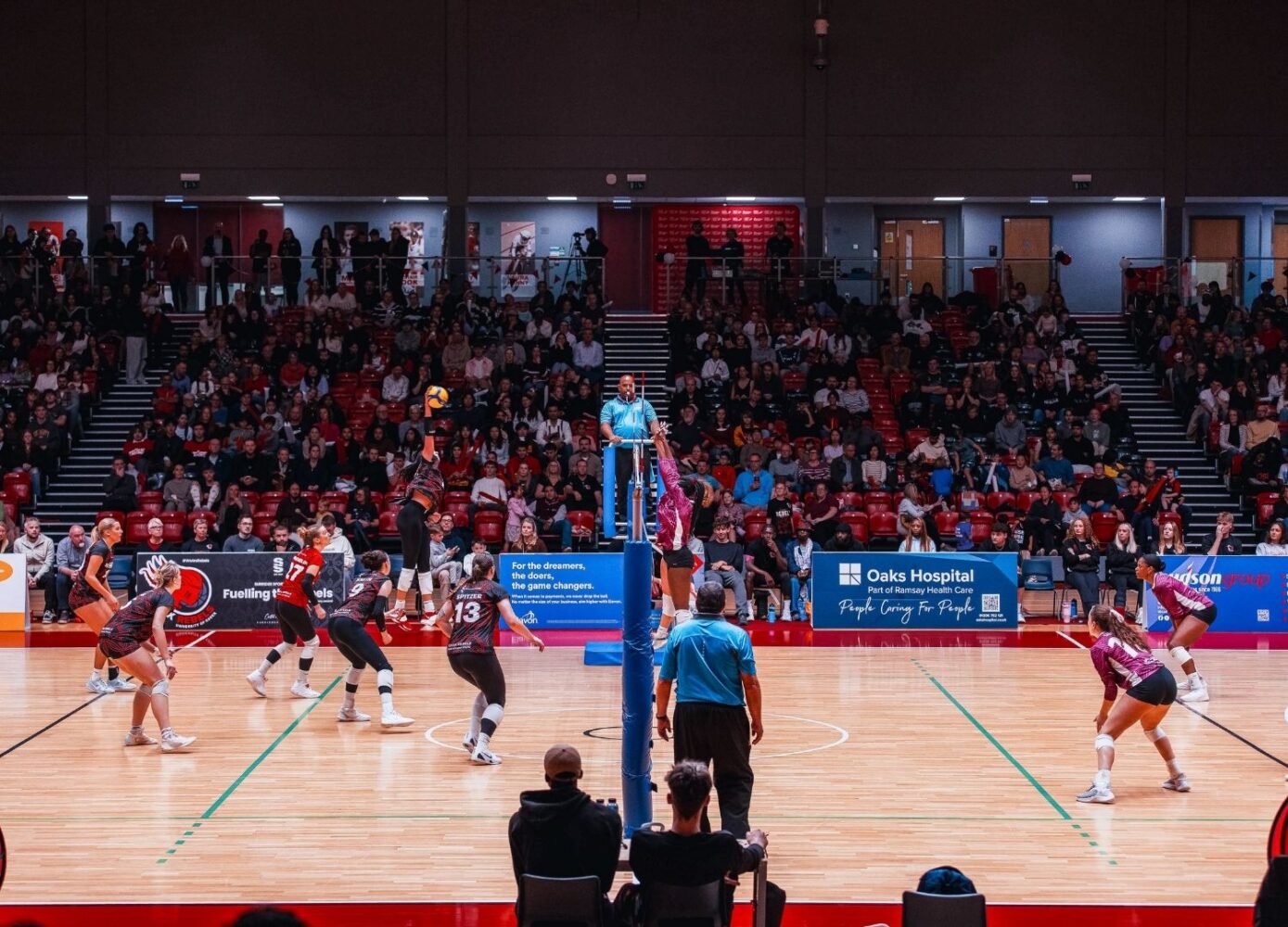 Women's Rebels Volleyball team in a match