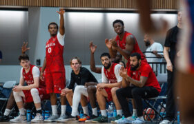 Rebels bench celebrating vs Portsmouth Force