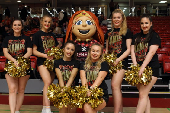 Queen B with cheerleaders